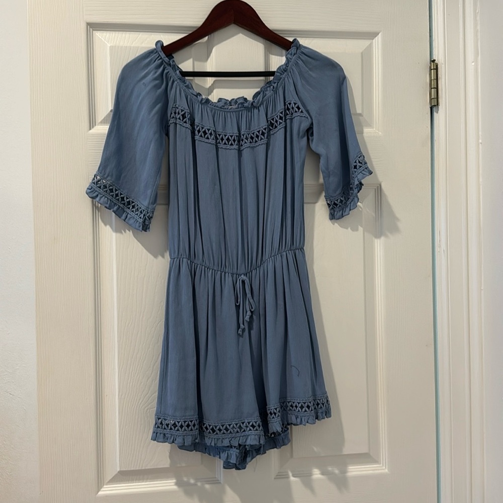 Blue romper fits like a small